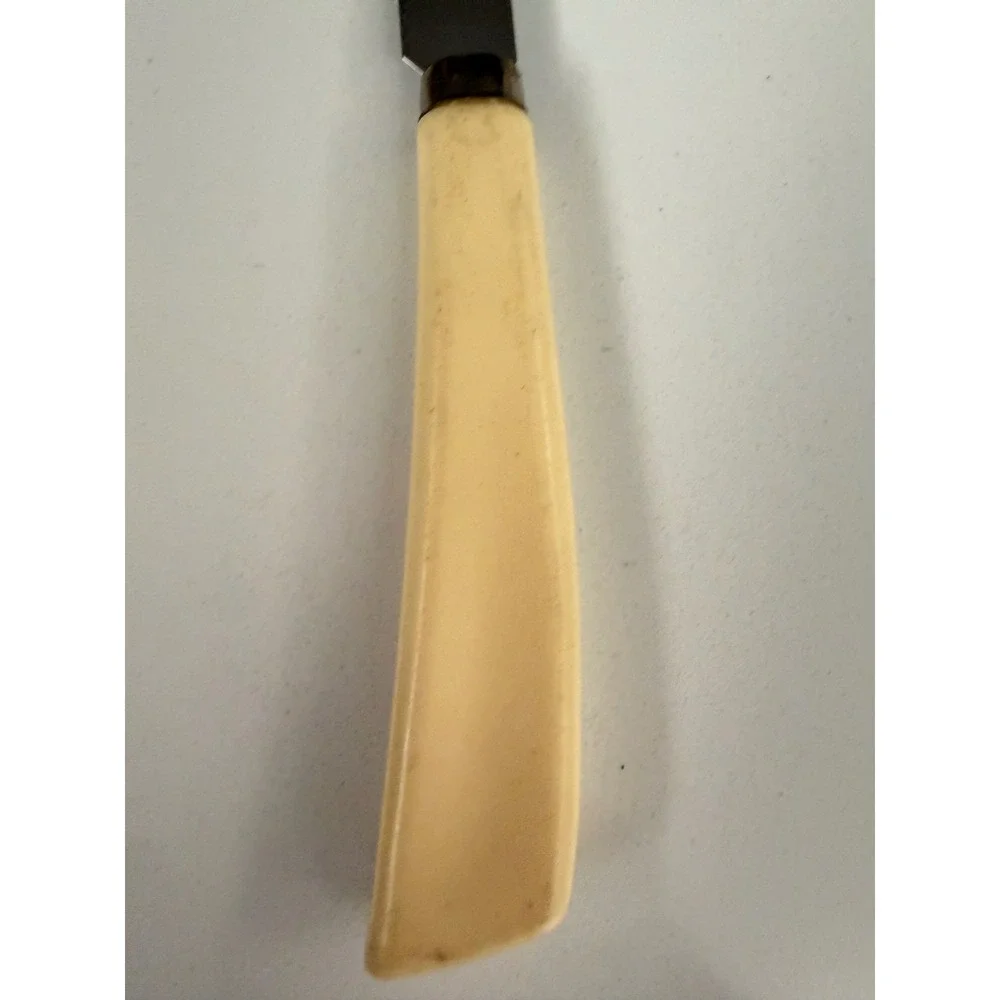 Vintage Quikut Stainless Steel Serrated Steak Knife USA Cream Handle Cutlery